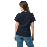 Back view of a model wearing a Unisex classic tee in black, showcasing its stylish design and fit.