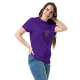 Unisex classic tee in purple worn by a smiling woman, showcasing a trendy and structured look.