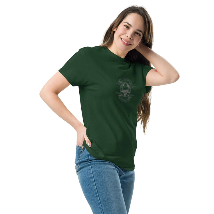Woman wearing a Unisex classic tee in dark green, showcasing a stylish and structured look perfect for streetwear.
